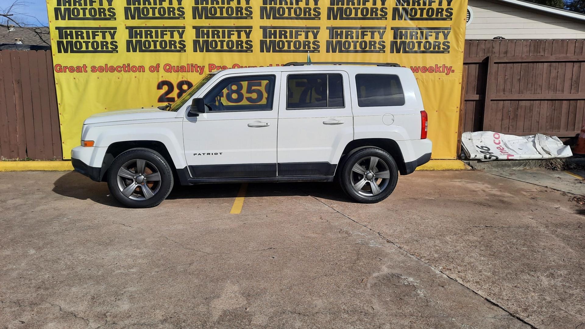 2015 Jeep Patriot (1C4NJPFA8FD) , located at 16710 Clay Rd., Houston, TX, 77084, (281) 859-7900, 29.834864, -95.656166 - Photo#0